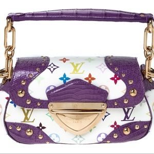 Authentic Vintage Louis Vuitton 


Alligator Monogram Multicolor Marilyn White